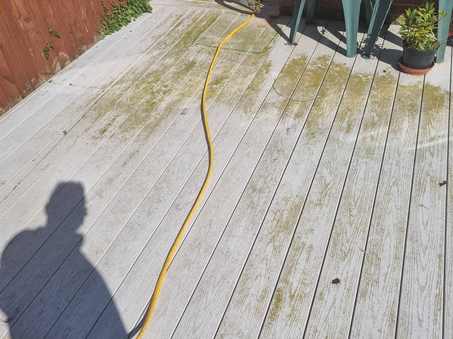 Pressure washing an outdoor surface