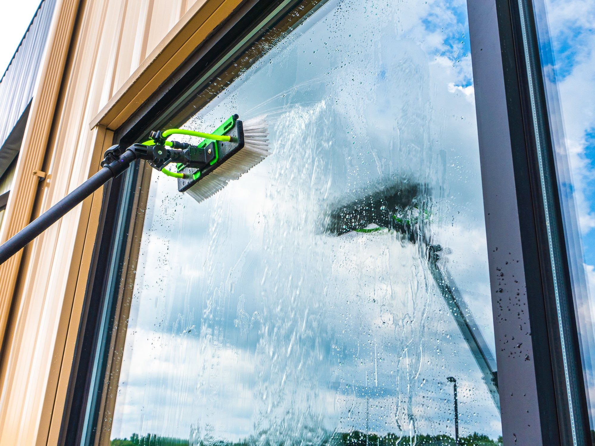 Water-fed pole window cleaning service at a property